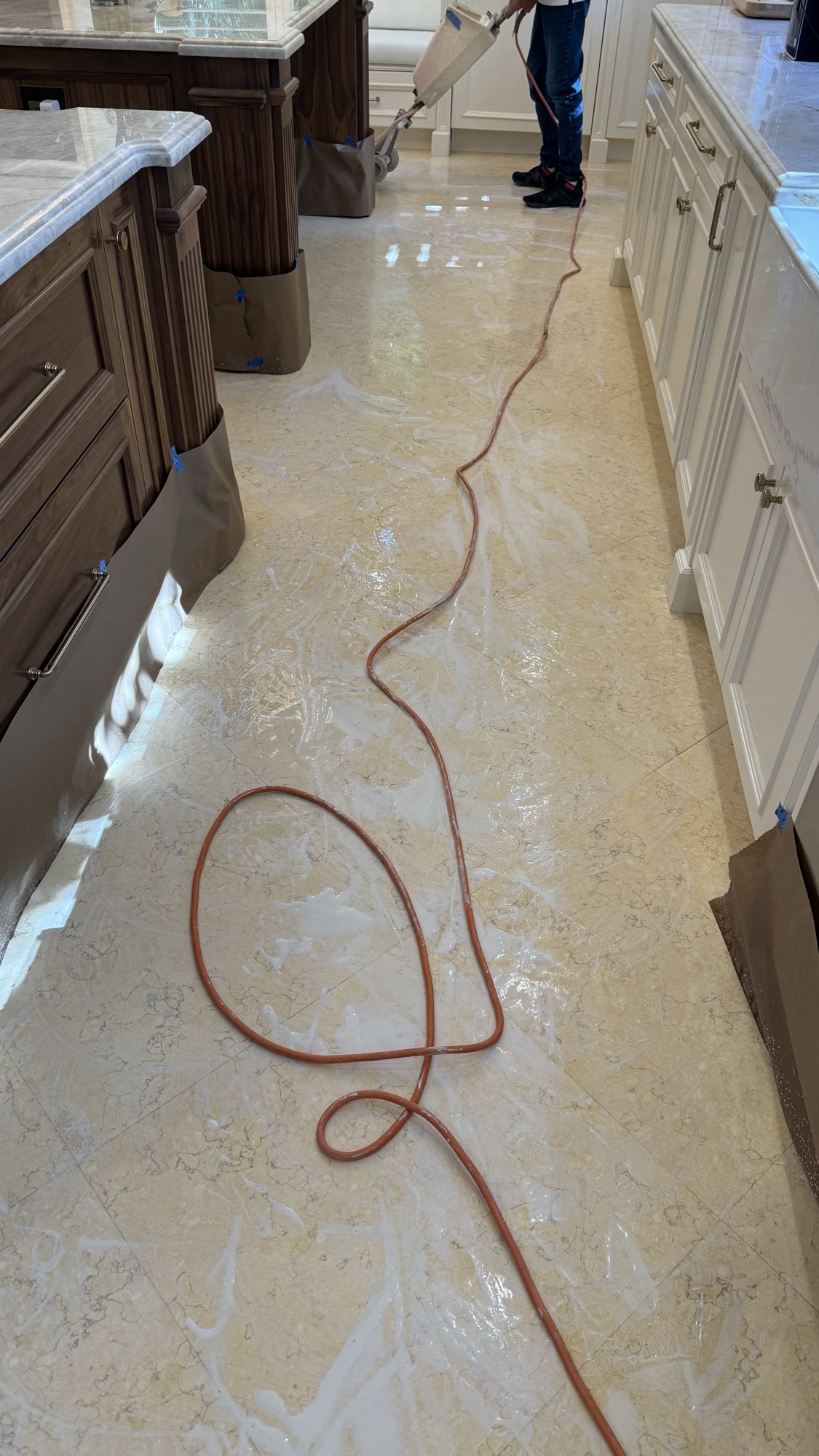 Kitchen floor during active restoration work